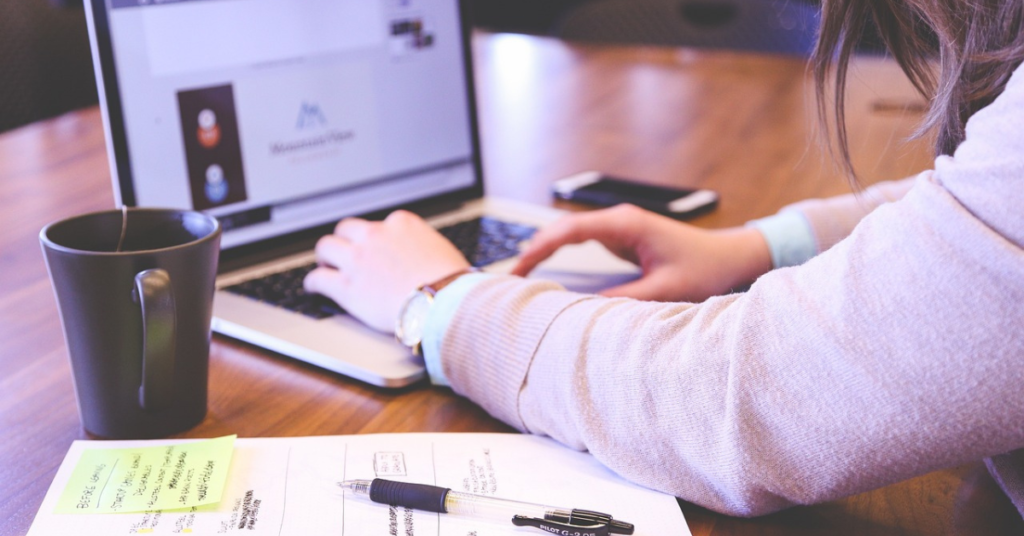 Business owner using digital tools to improve operations in a regional office