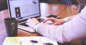 Business owner using digital tools to improve operations in a regional office